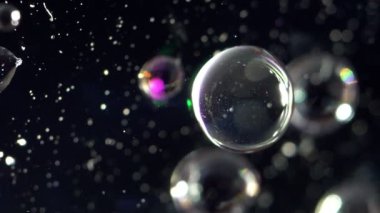 Movement of microparticles in the water drop