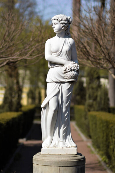 Classic white marble statue of a goddess Demeter