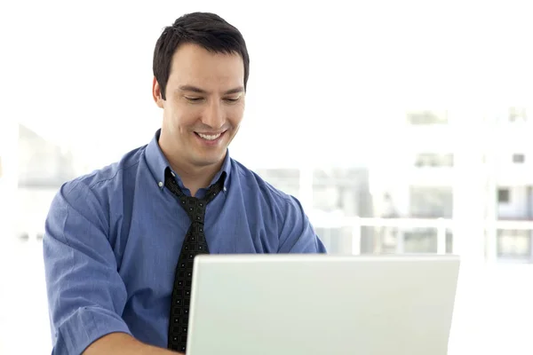 Successful businessman at workplace Stock Image