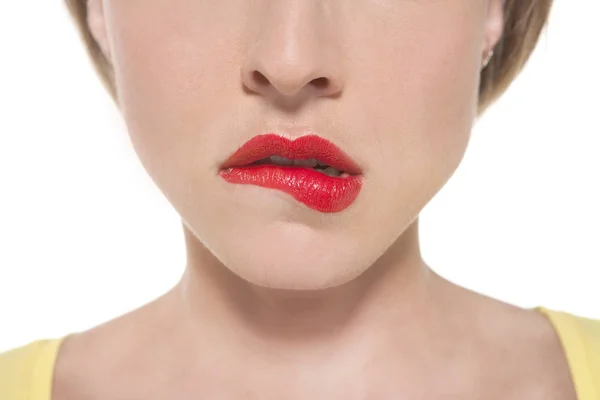 Vrouw haar lippen bijten — Stockfoto