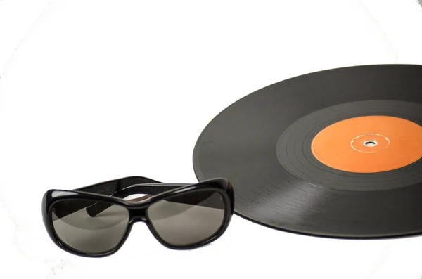 Vintage vinyl record i okulary — Zdjęcie stockowe