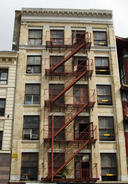 The typical old houses with fire stairs in Manhattan New York