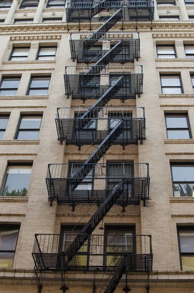 The typical old houses with fire stairs in Manhattan New York