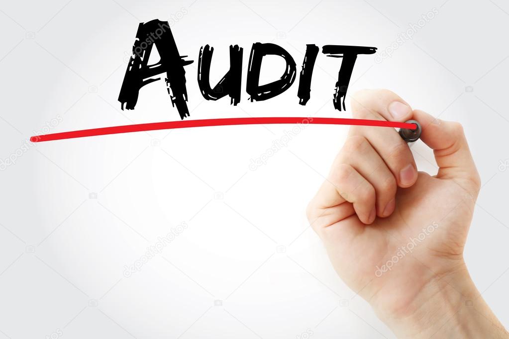Hand writing Audit with marker