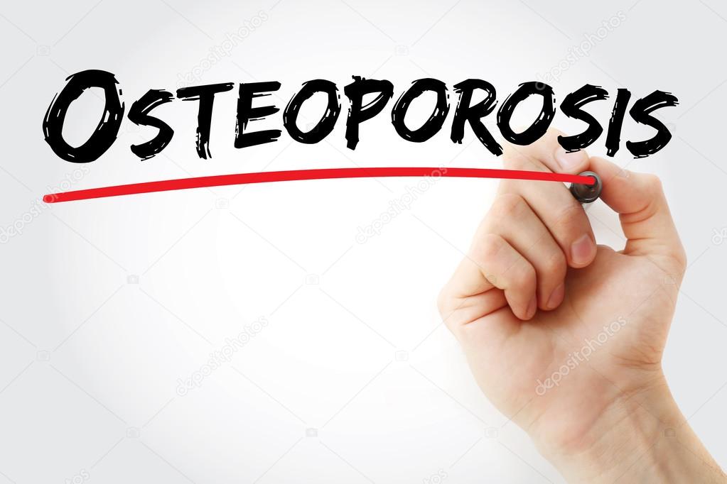 Hand writing Osteoporosis with marker