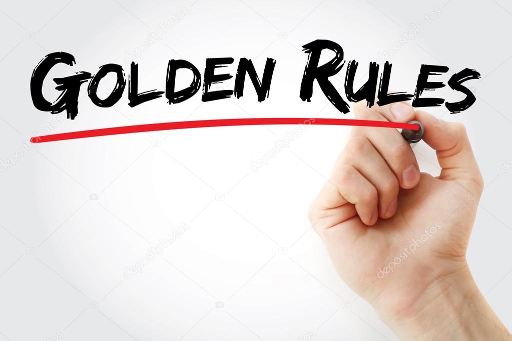 Hand writing Golden Rules with marker