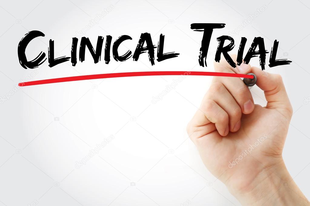 Hand writing Clinical Trial with marker