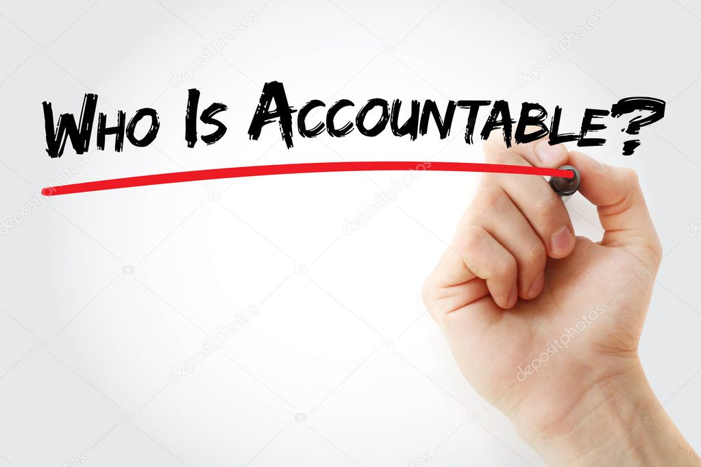 Hand writing Who Is Accountable? with marker