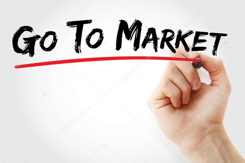 Hand writing Go To Market with marker