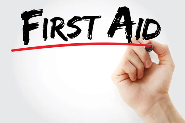 Hand writing First aid with marker — Stock Photo, Image