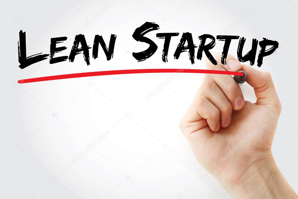 Hand writing Lean startup with marker