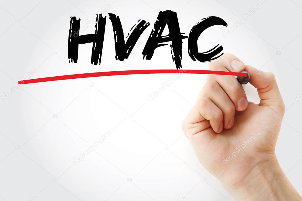 Hand writing HVAC with marker