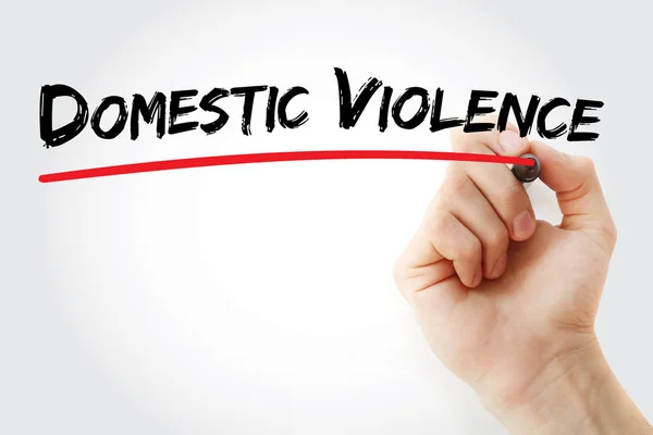 Hand writing Domestic violence with marker — Stock Photo, Image