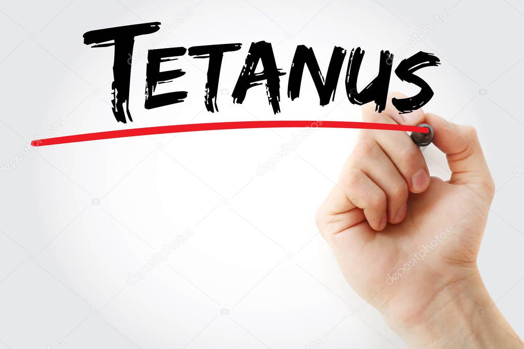 Hand writing Tetanus with marker