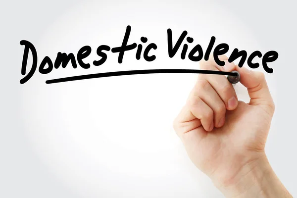 Hand writing Domestic violence with marker — Stock Photo, Image
