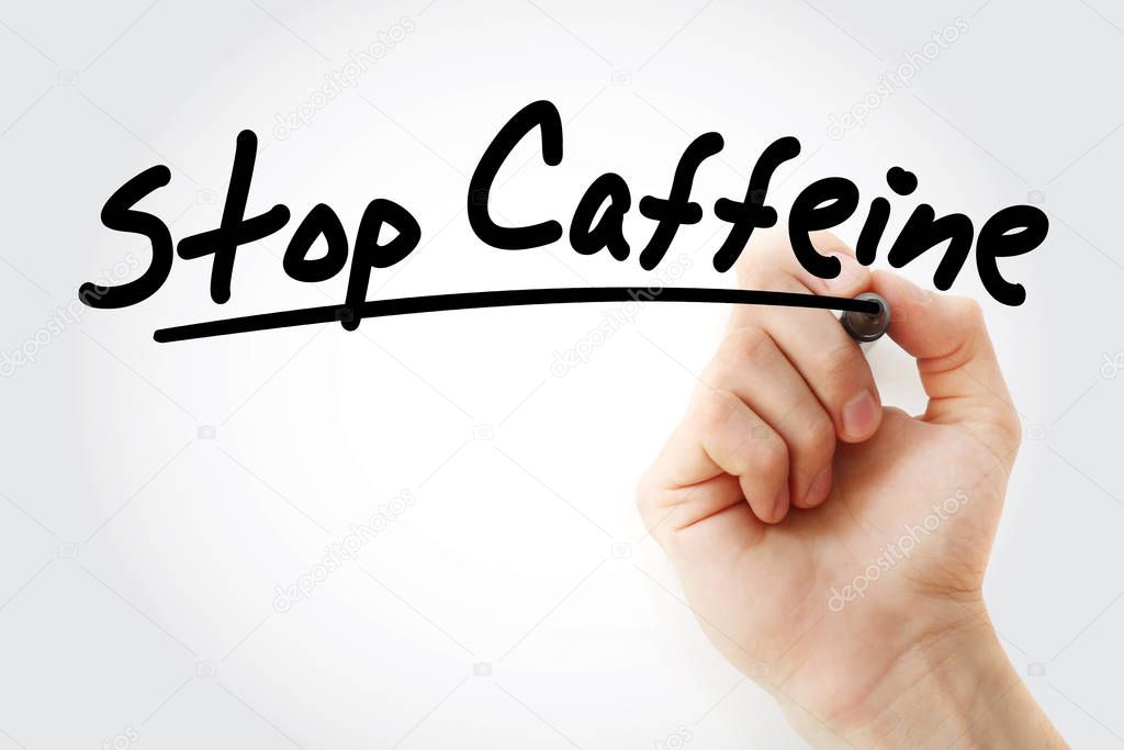 Hand writing Stop Caffeine with marker