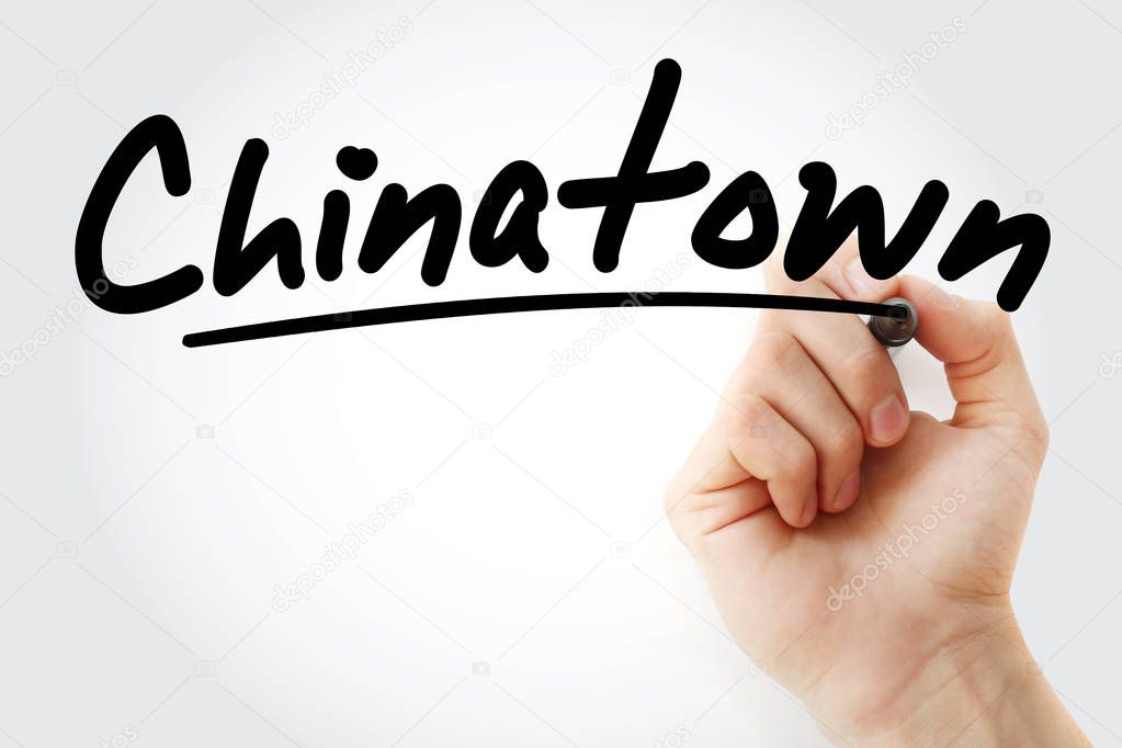 Hand writing Chinatown with marker