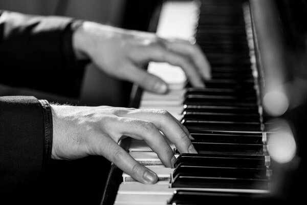 musician playing piano 