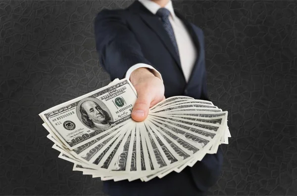 Businessman with money in hand — Stock Photo, Image