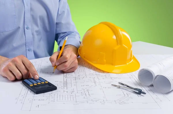 Architect working with blueprints — Stock Photo, Image