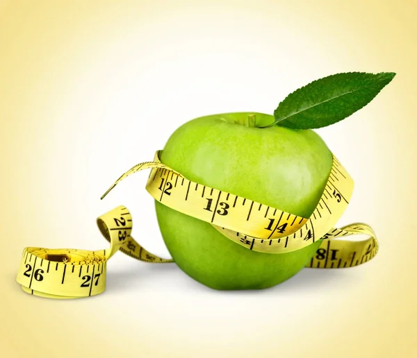Manzanas verdes midieron el medidor —  Fotos de Stock