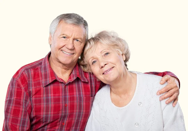 Šťastný starší pár s úsměvem doma — Stock fotografie