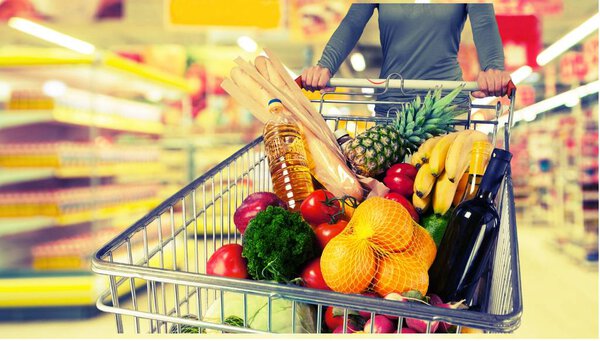 Woman with cart shopping