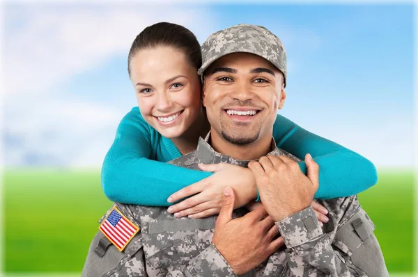 Smiling soldier with his wife — Stock Photo, Image