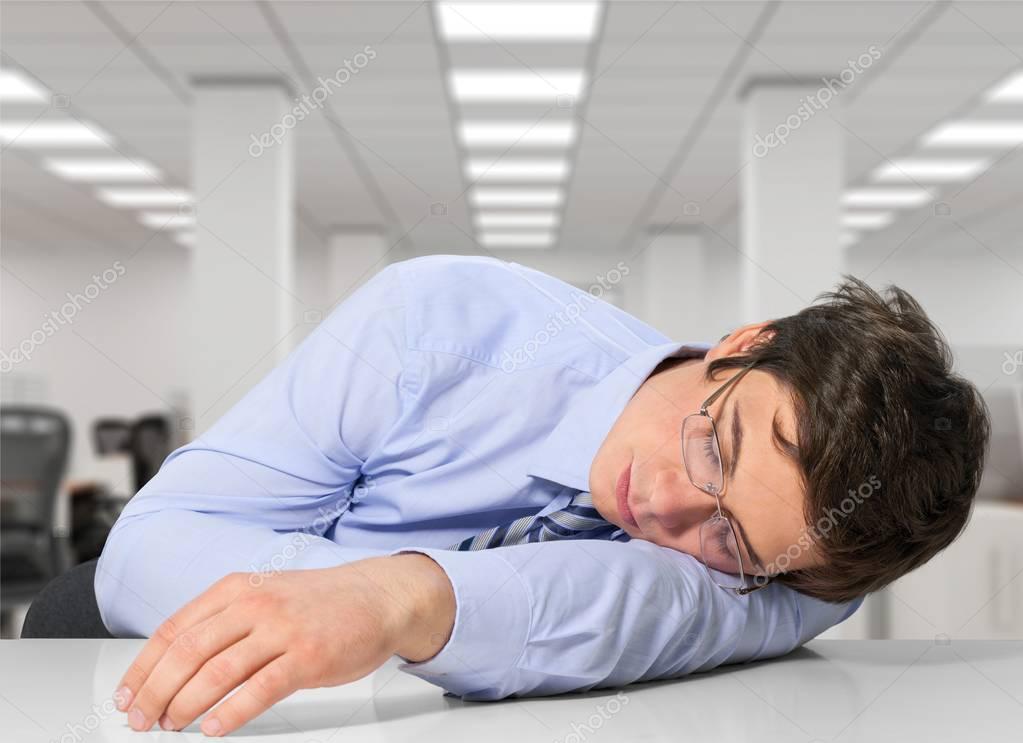 Businessman Sleeping On A Desk Stock Photo C Billiondigital