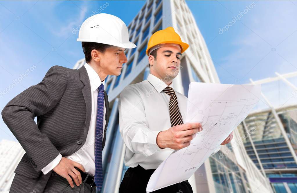 two engineers men at construction site