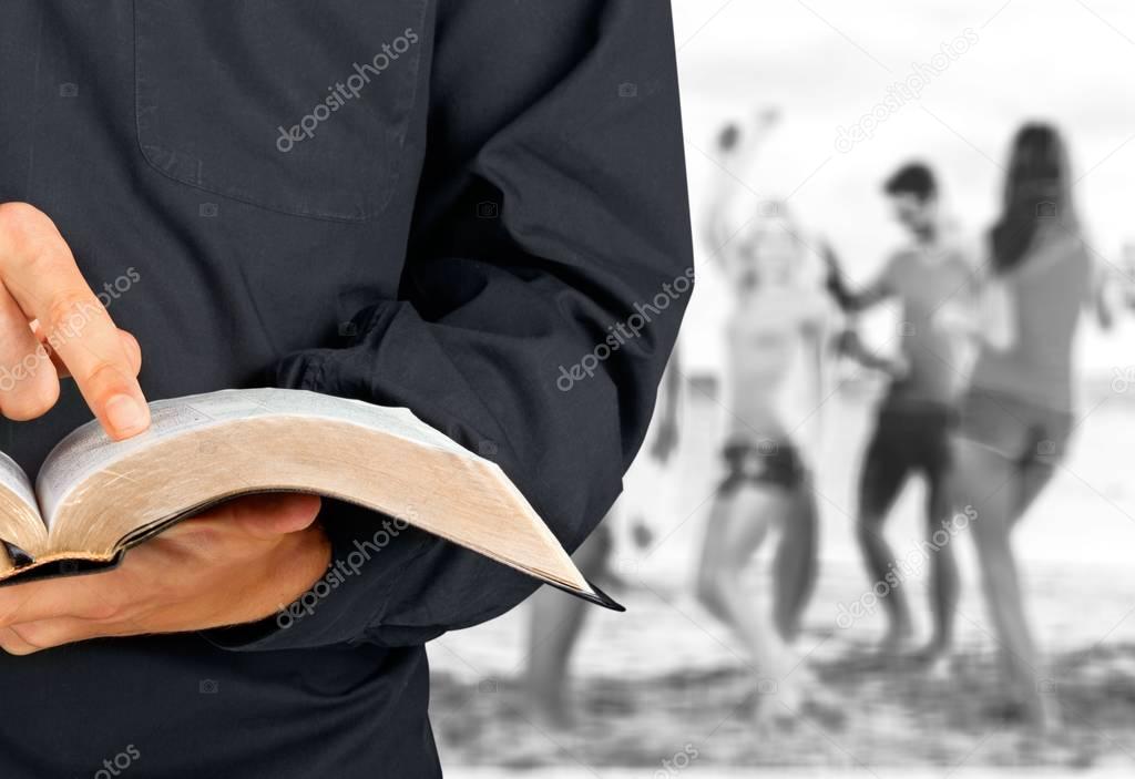 Man reading old heavy book Stock Photo by ©billiondigital 129206862