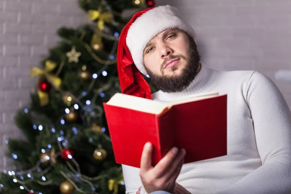 Young Man wearing Santa's Hat — Stock Photo, Image