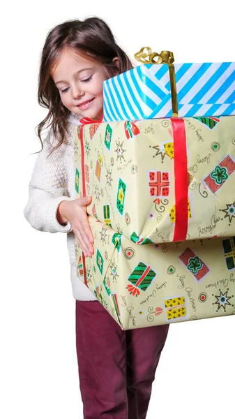 Девочка с подарочными коробками — стоковое фото