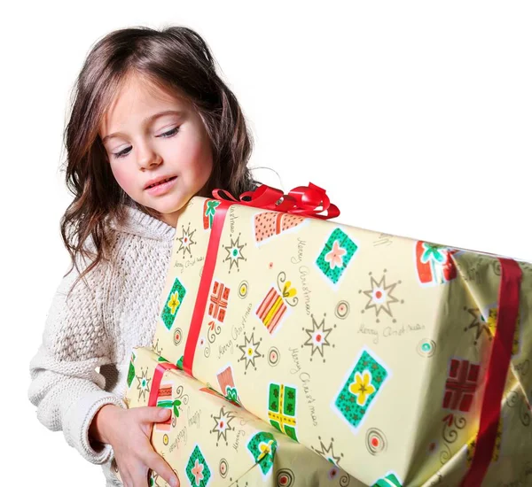 Kleines Mädchen mit Geschenkschachteln — Stockfoto