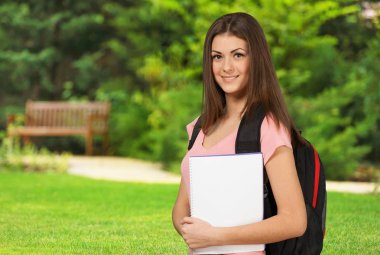 Genç öğrenci kız kitap