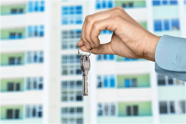 Keys in hand isolated — Stock Photo, Image