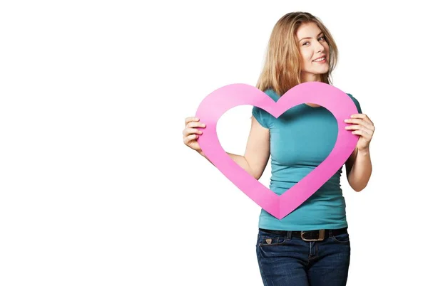 Ragazza che tiene il cuore di carta rosa — Foto Stock