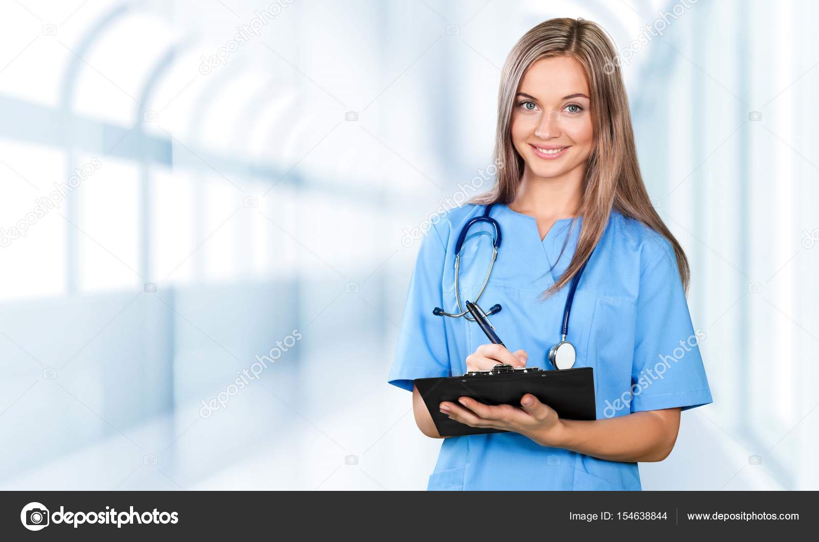 Про жен врачей. Женщина врач. Девушка врач. Девушка врач улыбается. Врач в синем халате.