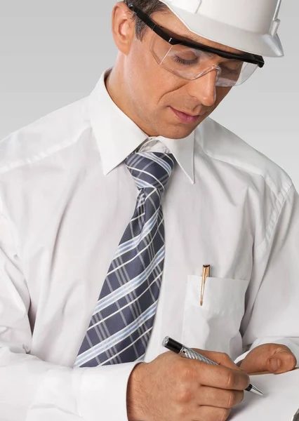 Man in white shirt working — Stock Photo, Image