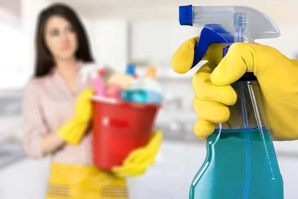 Hand in glove and spray — Stock Photo, Image