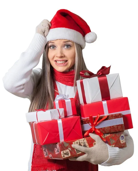 Blonde vrouw met stapel geschenken — Stockfoto