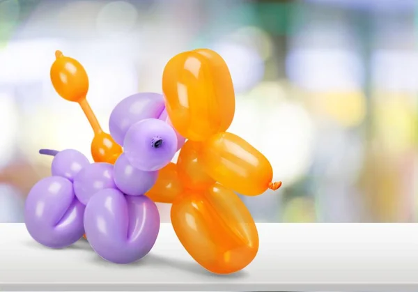 two balloons in shape of animals