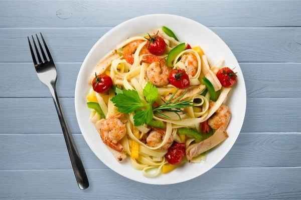 Delicious pasta  on white plate — Stock Photo, Image