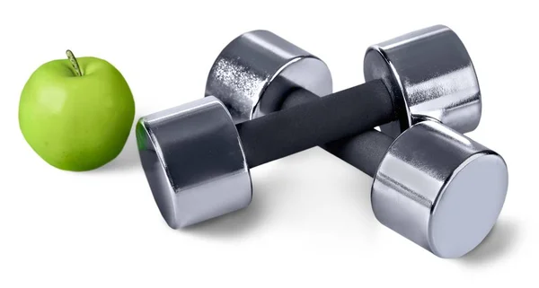 Two Dumbbells And Apple — Stock Photo, Image