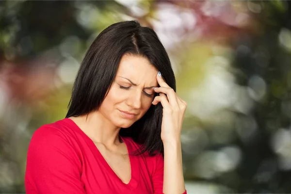 Depressed woman with headache — Stock Photo, Image