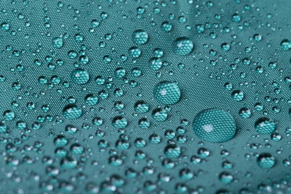 Water drops on blue — Stock Photo, Image