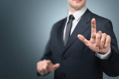 iş adamı Puan onun parmak 