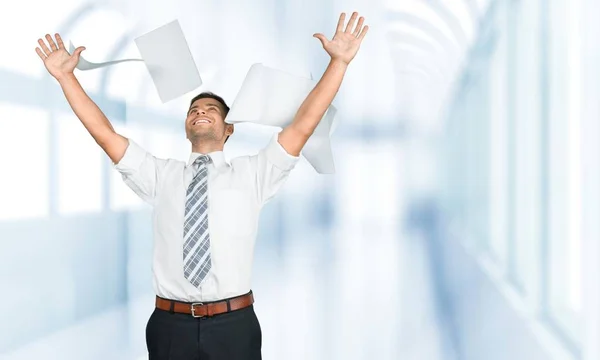 Man throwing up paper — Stock Photo, Image