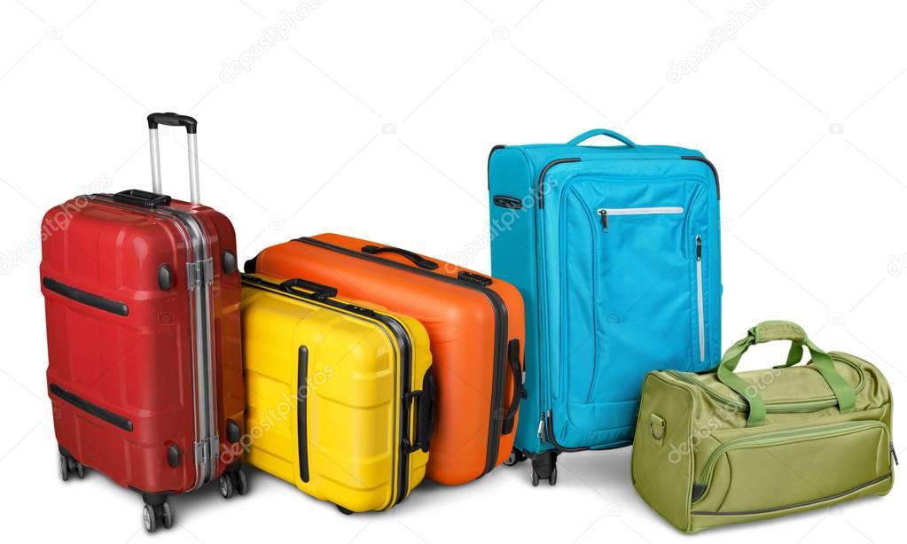 colorful suitcases on white