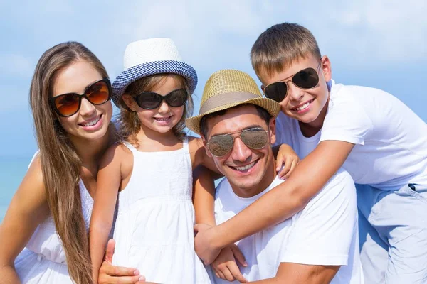 Happy family on vacations — Stock Photo, Image